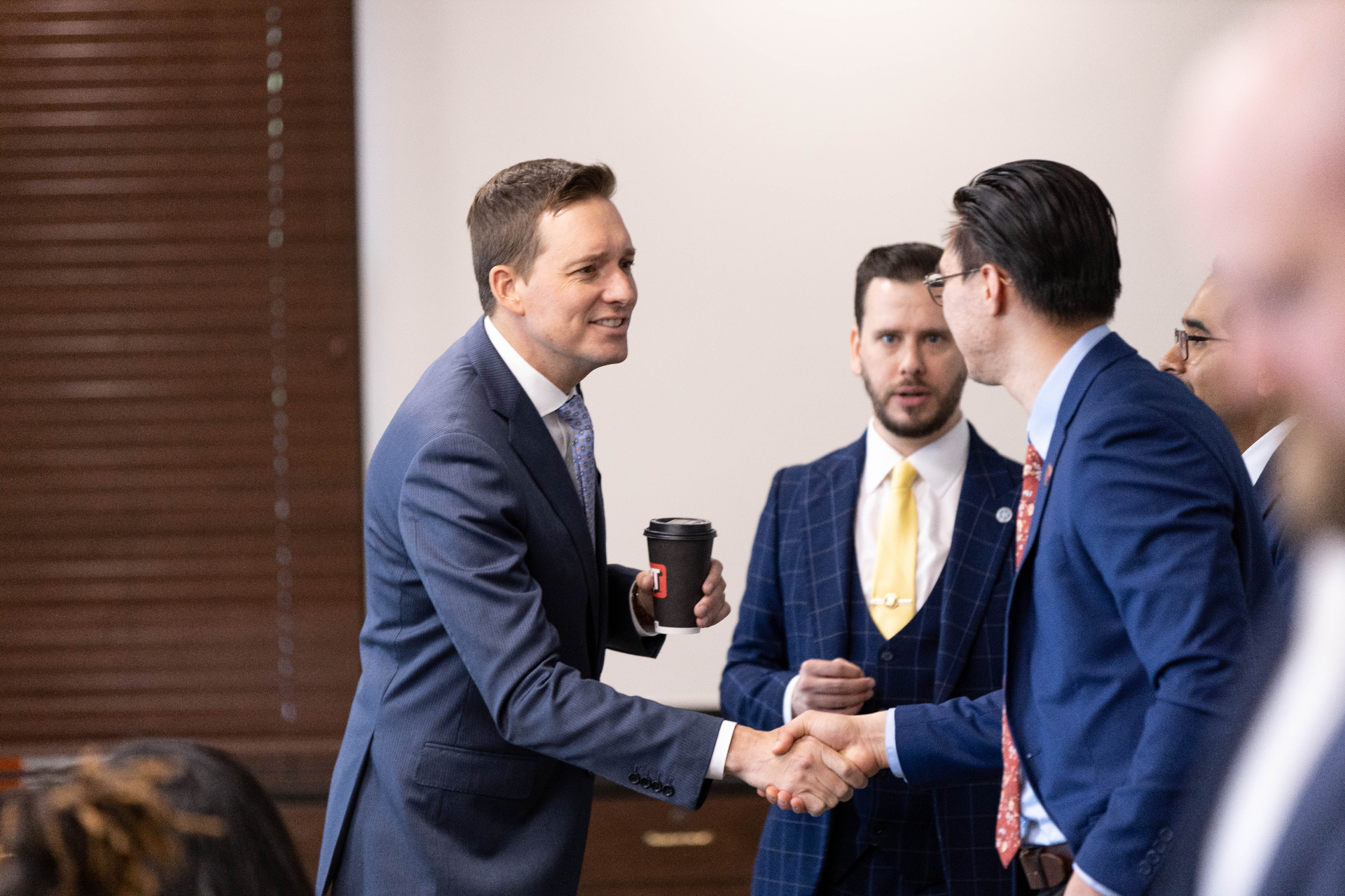 Young professionals shaking hands at the Capitol